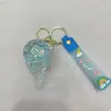 Creative ice cream drift bottle keychain cartoon ice cream flowing sand bottle key pendant details Picture